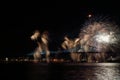 Colorful fireworks explode over bridge. MontrealÃ¢â¬â¢s 375th anniversary. luminous colorful interactive Jacques C Royalty Free Stock Photo
